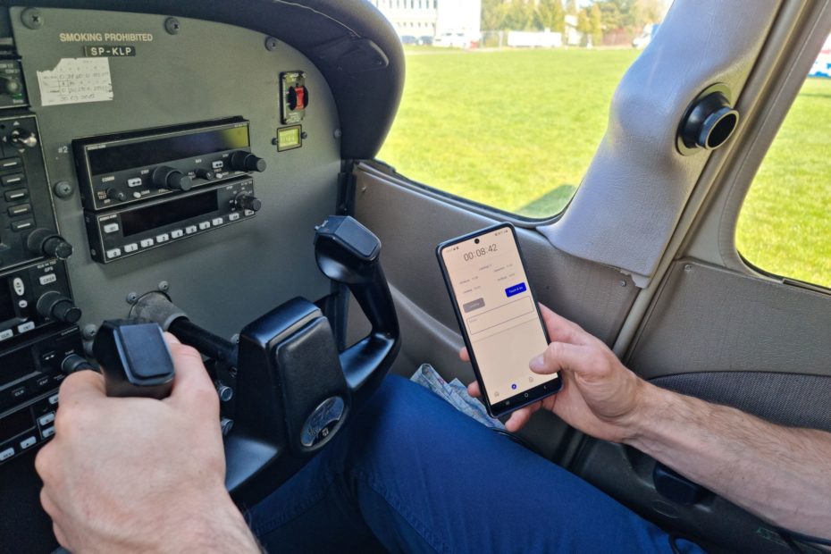 Pilot in the aircraft with mobile Best Pilot app